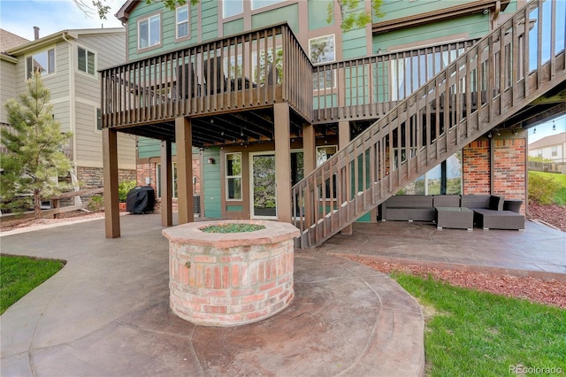 23427 Song Bird Hills Pl, Parker, CO 80138 - view of patio / terrace with a fire pit and a deck