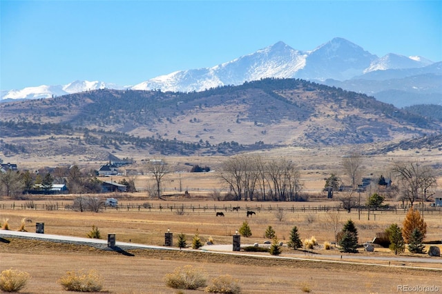 mountain view featuring a rural view