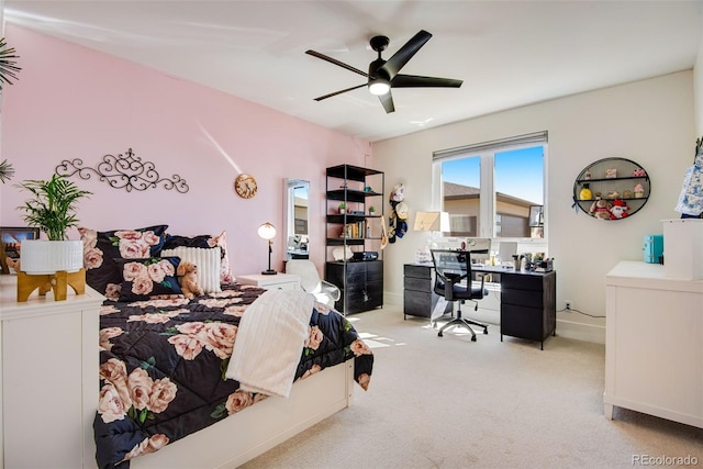 bedroom with baseboards, carpet floors, and ceiling fan