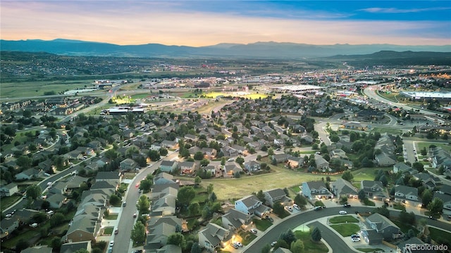 aerial view at dusk with a mountain view