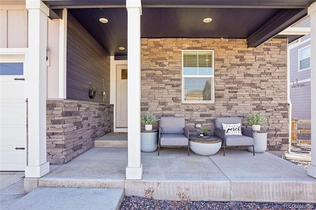 view of patio featuring a porch