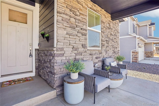 entrance to property featuring stone siding