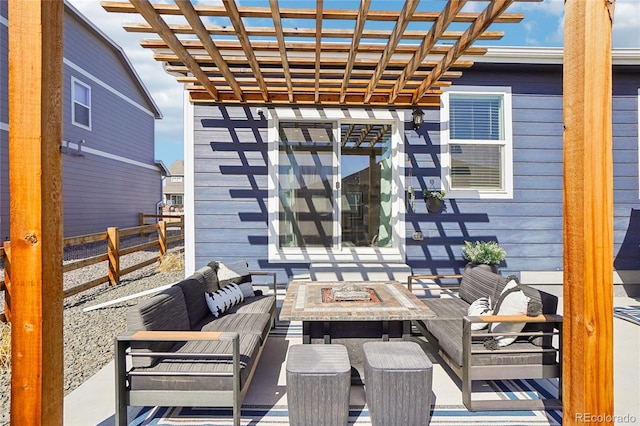 view of patio with a pergola, an outdoor living space with a fire pit, and fence