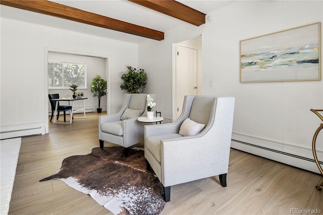 living area with a baseboard radiator, light wood-type flooring, and beamed ceiling