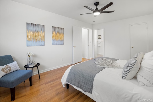 bedroom with wood-type flooring and ceiling fan