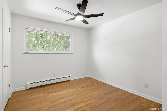 empty room with ceiling fan, light hardwood / wood-style flooring, and a baseboard radiator