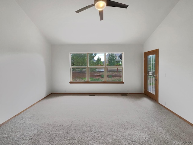 584 W Prestwick Way, Castle Rock, CO 80104 - carpeted spare room with vaulted ceiling, ceiling fan, and baseboards