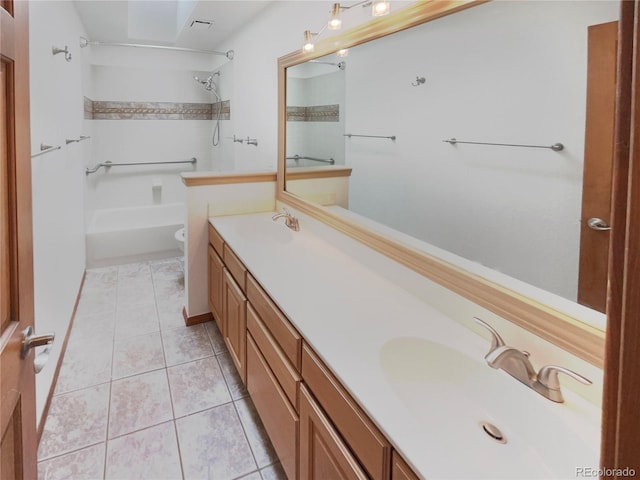 584 W Prestwick Way, Castle Rock, CO 80104 - full bath with double vanity, tile patterned flooring, toilet, and washtub / shower combination
