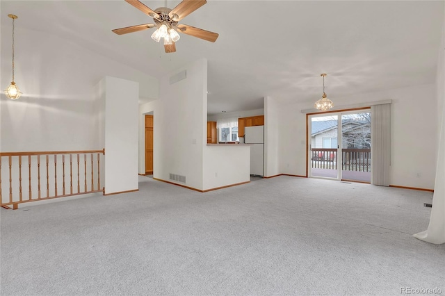 unfurnished living room with light carpet, baseboards, and visible vents