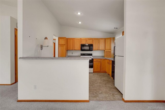 kitchen featuring electric stove, light colored carpet, freestanding refrigerator, vaulted ceiling, and black microwave