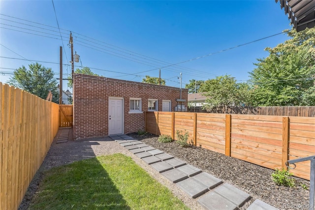 view of yard featuring a fenced backyard