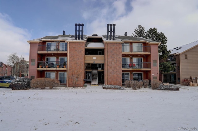 view of snow covered property