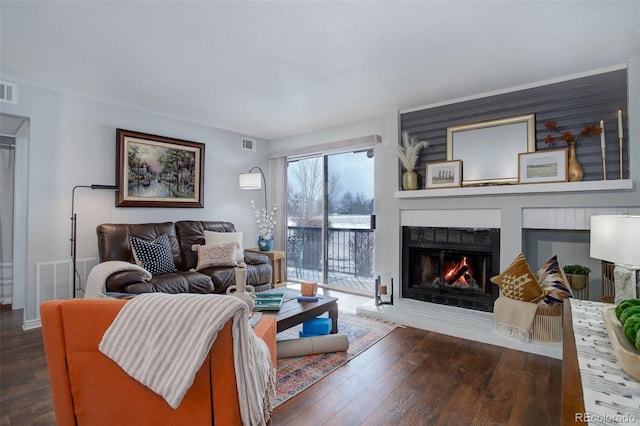 living room with dark hardwood / wood-style floors