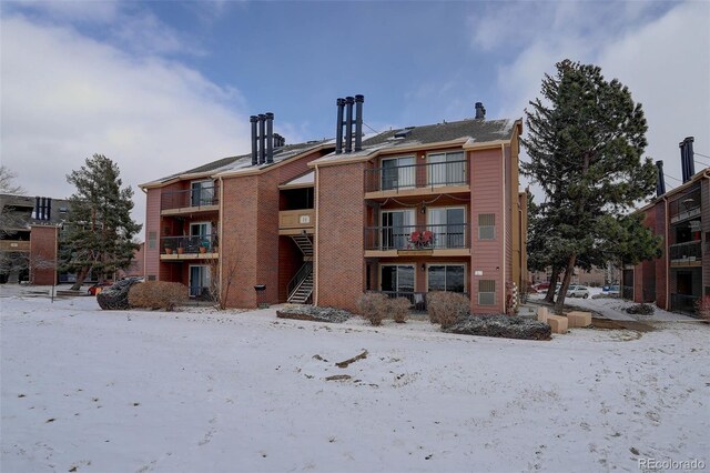 view of snow covered building