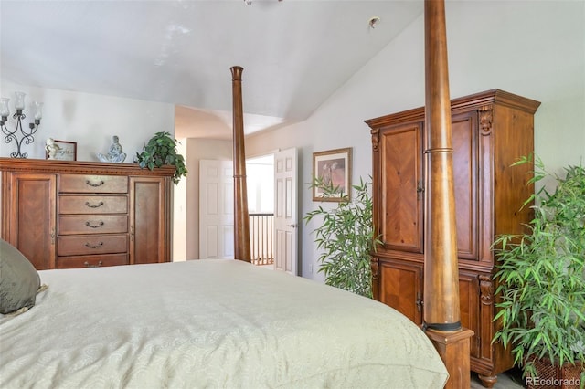 bedroom with vaulted ceiling