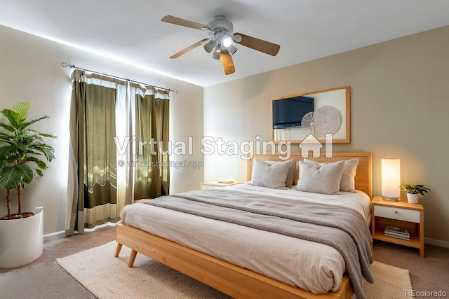 carpeted bedroom with ceiling fan