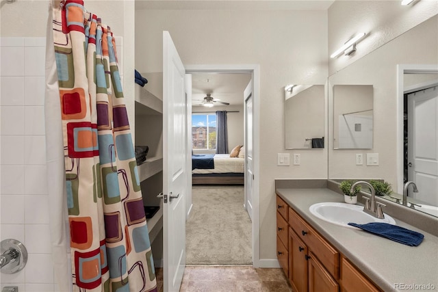 4100 Albion St Unit 424, Denver, CO 80216 - full bath with ensuite bathroom, vanity, a shower with shower curtain, and a ceiling fan