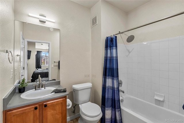 4100 Albion St Unit 424, Denver, CO 80216 - ensuite bathroom featuring vanity, shower / tub combo, and a textured wall