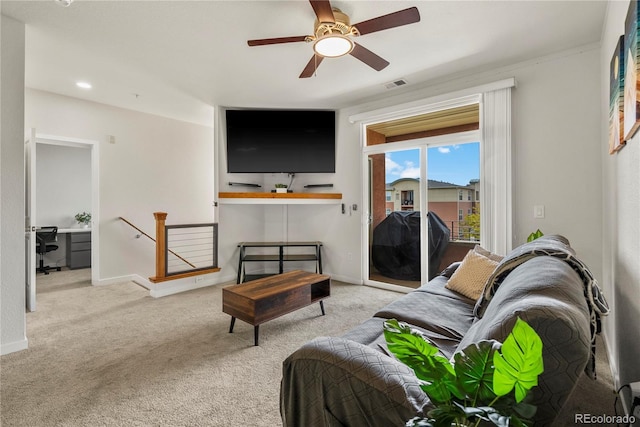 4100 Albion St Unit 424, Denver, CO 80216 - living area featuring carpet and a ceiling fan