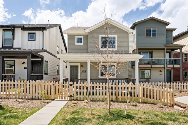 320 Marshall Mews, Superior, CO 80027 - view of front of property featuring a porch and a fenced front yard