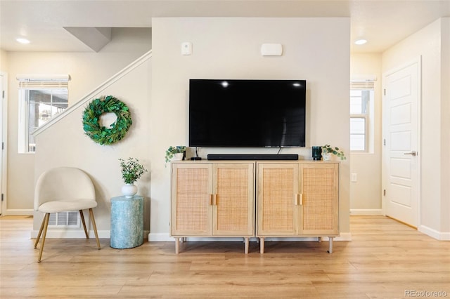 320 Marshall Mews, Superior, CO 80027 - living room with light wood finished floors, baseboards, plenty of natural light, and recessed lighting