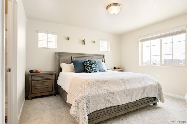 320 Marshall Mews, Superior, CO 80027 - bedroom with light carpet and baseboards