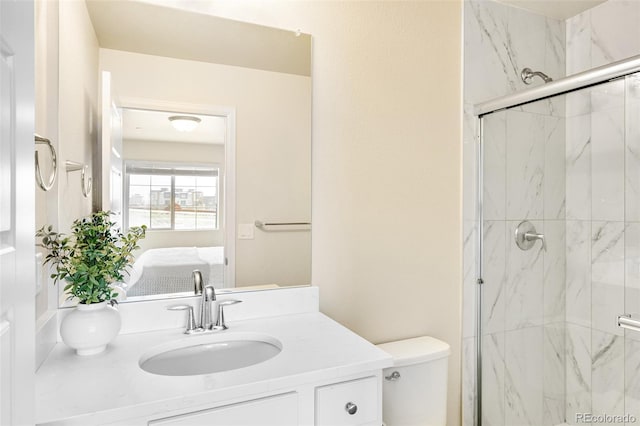 320 Marshall Mews, Superior, CO 80027 - ensuite bathroom featuring a marble finish shower, toilet, and vanity