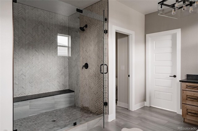 27608 E Ottawa Ave, Aurora, CO 80016 - full bath with a stall shower, baseboards, and vanity