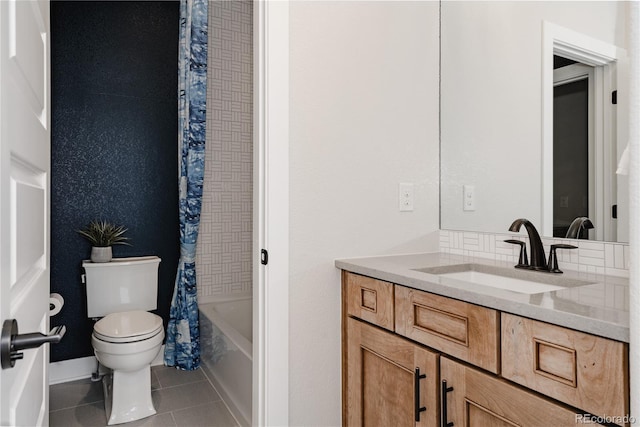 full bathroom with tile patterned floors, vanity, and toilet