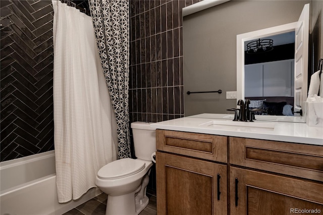 bathroom with vanity, toilet, and shower / tub combo