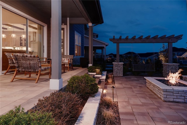 view of patio / terrace with a fire pit