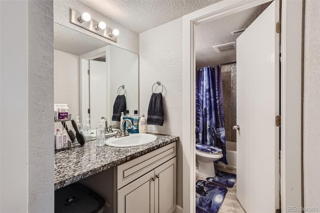 940 S Peoria St, Aurora, CO 80012 - full bathroom featuring a textured ceiling, vanity, toilet, shower / tub combo with curtain, and a textured wall