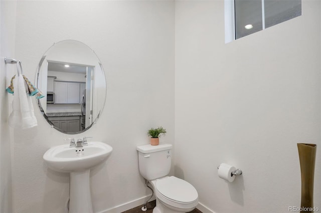 7017 Kali Ct, Frederick, CO 80530 - bathroom with toilet and baseboards