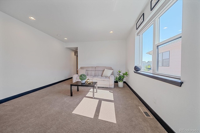6047 N Nepal Ct, Aurora, CO 80019 - living area featuring carpet floors and recessed lighting