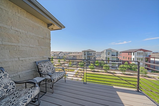 6047 N Nepal Ct, Aurora, CO 80019 - wooden terrace featuring a residential view