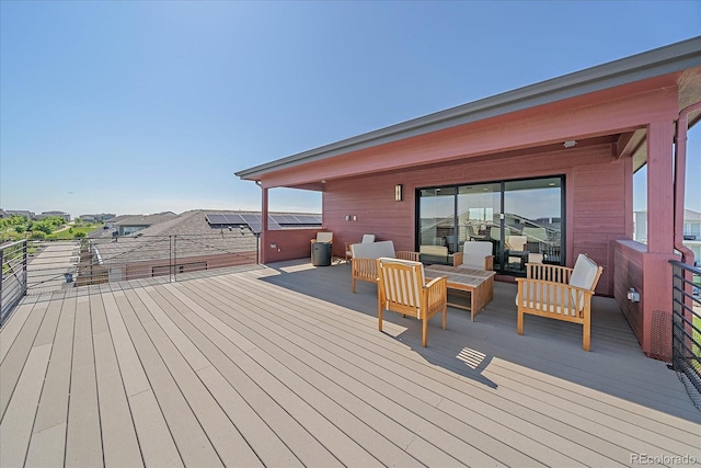 6047 N Nepal Ct, Aurora, CO 80019 - wooden terrace with an outdoor hangout area