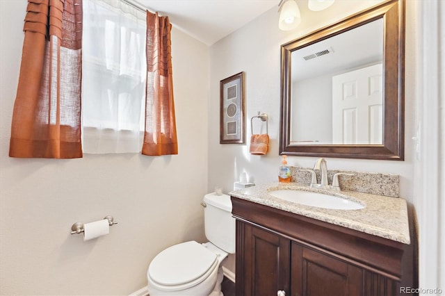 2905 E Yarrow Cir, Superior, CO 80027 - half bathroom featuring toilet, vanity, and baseboards