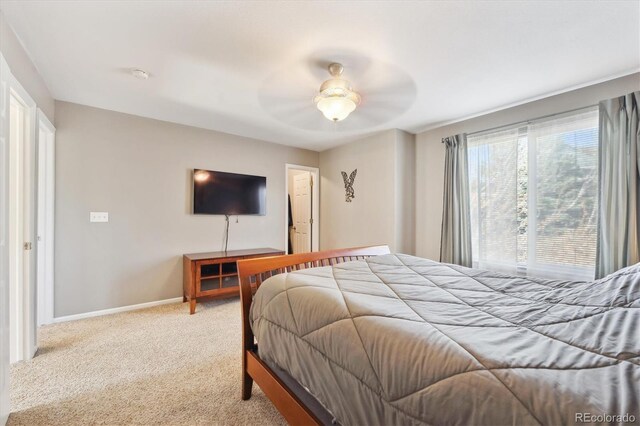 2905 E Yarrow Cir, Superior, CO 80027 - bedroom with carpet, baseboards, and a ceiling fan