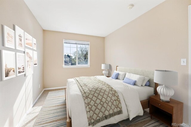 2905 E Yarrow Cir, Superior, CO 80027 - bedroom with baseboards and light colored carpet