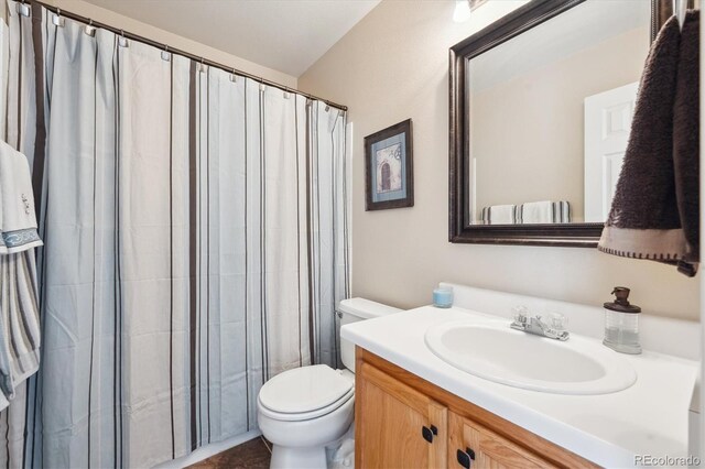 2905 E Yarrow Cir, Superior, CO 80027 - bathroom featuring toilet, vanity, and curtained shower