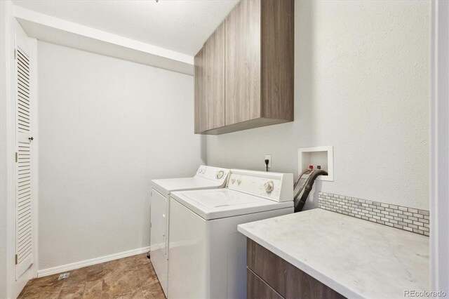 2905 E Yarrow Cir, Superior, CO 80027 - laundry area featuring cabinet space, washer and dryer, and baseboards