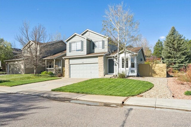 2905 E Yarrow Cir, Superior, CO 80027 - view of front facade featuring concrete driveway, an attached garage, and brick siding