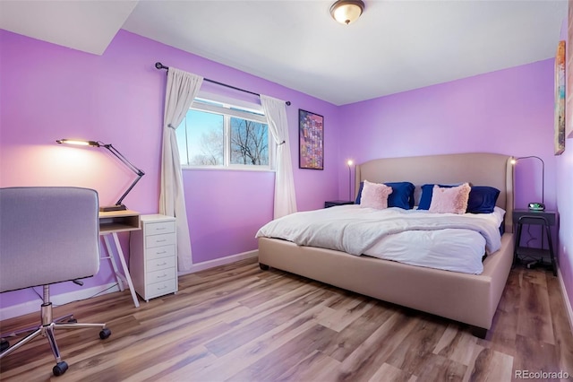 bedroom featuring light hardwood / wood-style floors