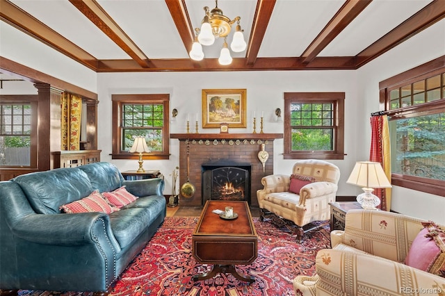 13 2nd St, Colorado Springs, CO 80906 - living room with a chandelier, a fireplace, and beam ceiling