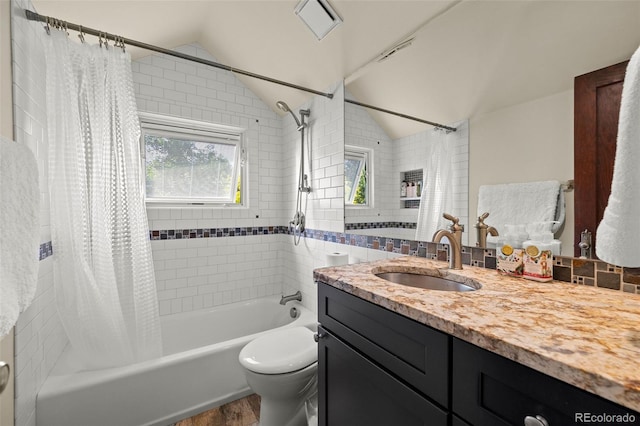 13 2nd St, Colorado Springs, CO 80906 - bathroom featuring shower / bath combo with shower curtain, vanity, vaulted ceiling, and wood finished floors