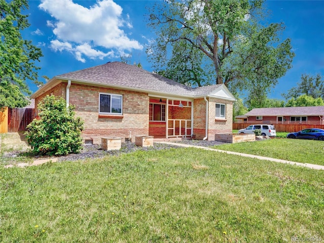 1600 Xanthia St, Denver, CO 80220 - ranch-style home featuring brick siding and a shingled roof