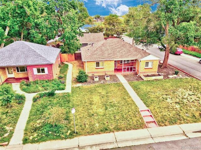 1600 Xanthia St, Denver, CO 80220 - view of front of property featuring brick siding, covered porch, and a shingled roof