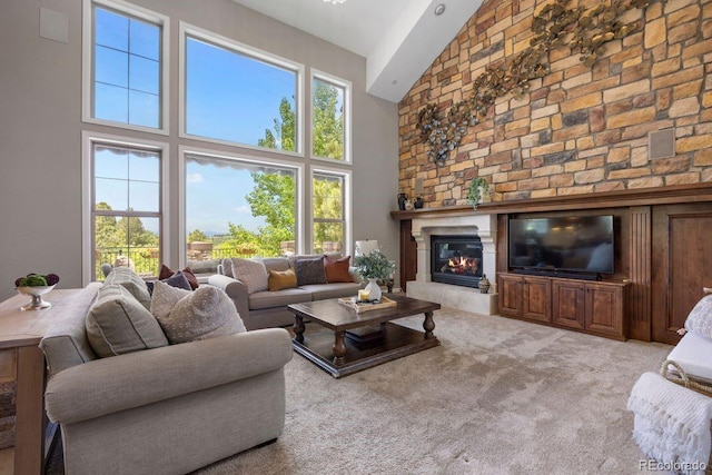 6299 Ellingwood Point Pl, Castle Rock, CO 80108 - carpeted living room with high vaulted ceiling and a glass covered fireplace