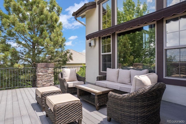 6299 Ellingwood Point Pl, Castle Rock, CO 80108 - wooden terrace with outdoor lounge area