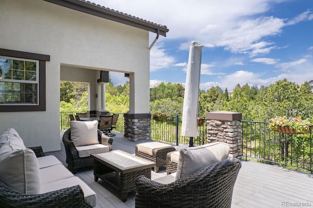 6299 Ellingwood Point Pl, Castle Rock, CO 80108 - wooden terrace featuring outdoor lounge area
